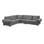Load image into Gallery viewer, A dark grey full back corner sofa with six seats and chrome feet, displayed in a room setting.
